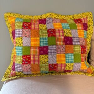 pair of standard pillow shams, purchased at April Cornell, multi color